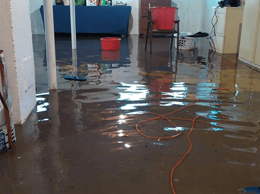 Basement with boiler, cabinets and washing machine completely flooded in Staten Island, NY